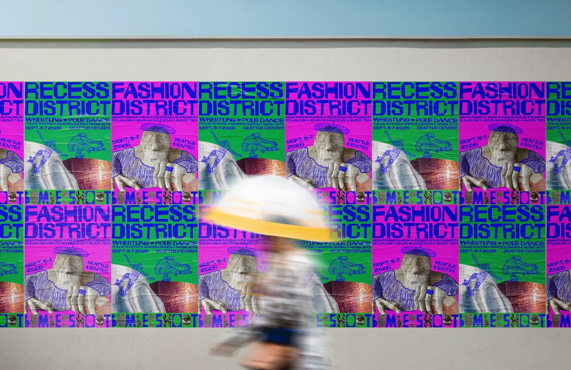Bumbershoot poster shown in a bus stop mockup